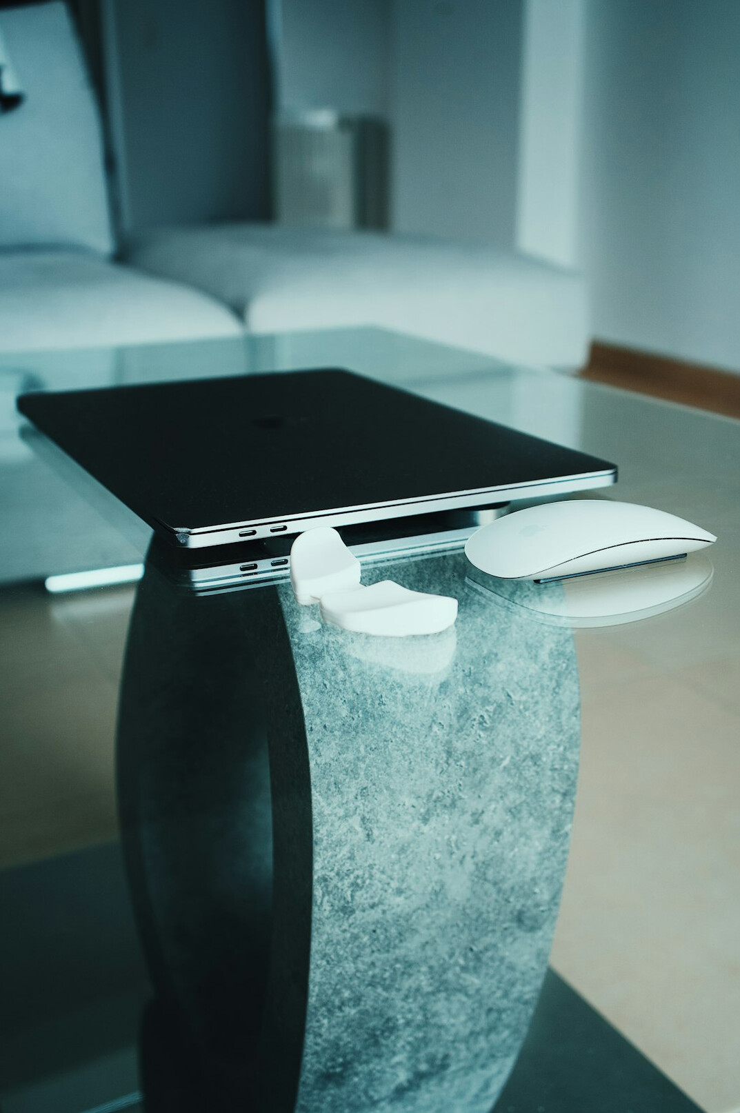 Desk with documents, magnifying glass and laptop used for fact-checking