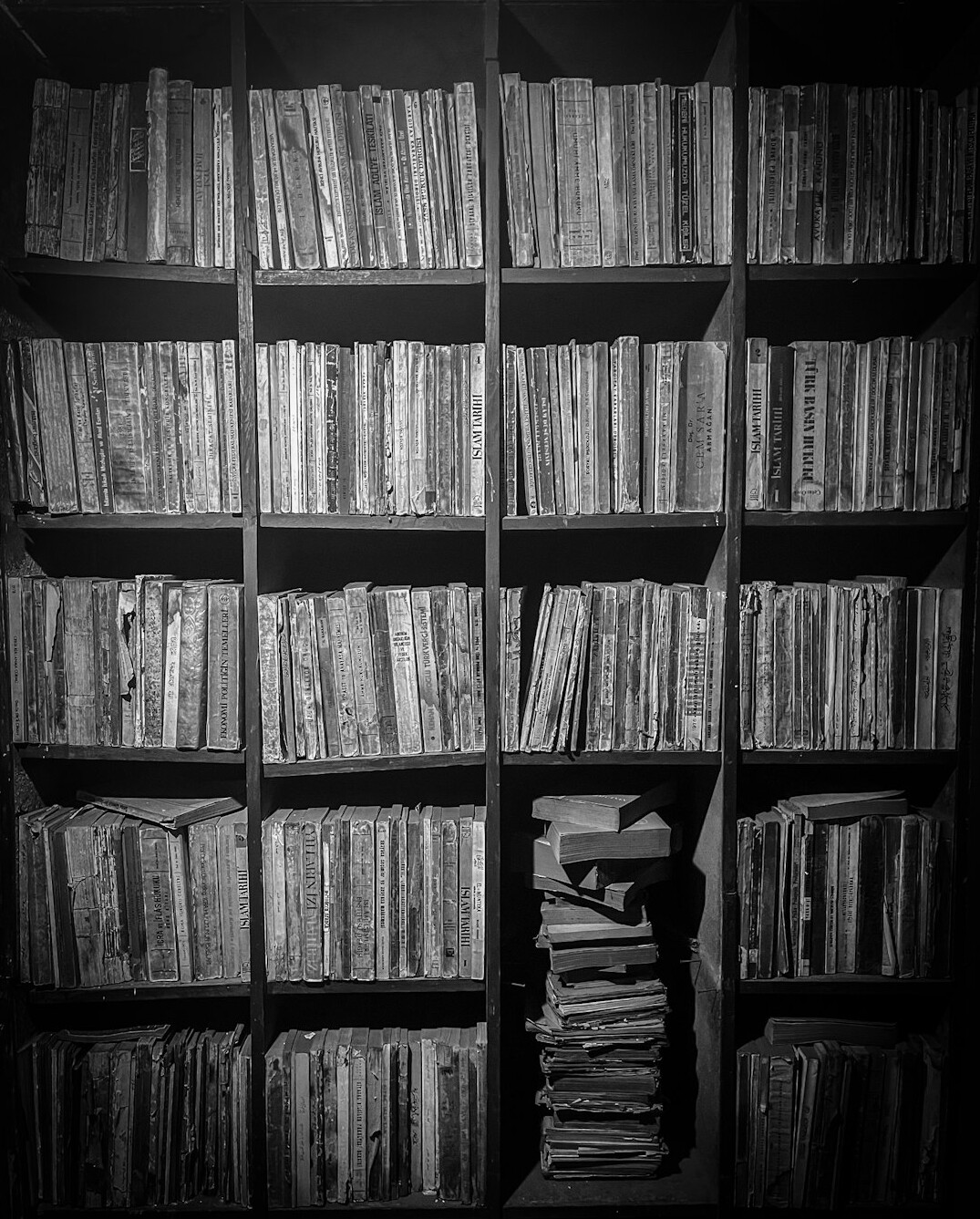Rows of archive shelves with newspapers and folders